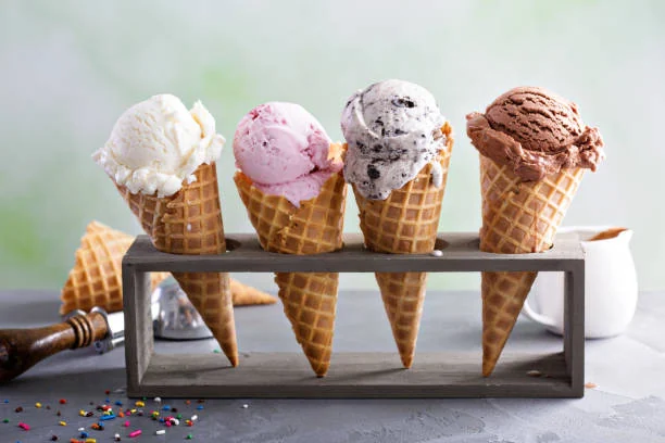 Selection of homemade gelato flavours in waffle cones